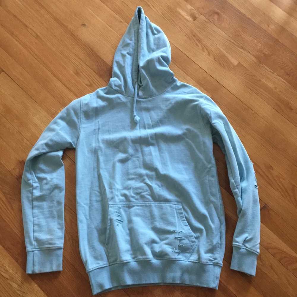 Teal sweatshirt.
